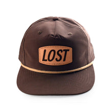 Load image into Gallery viewer, Brown cap with 'LOST' patch on a white background
